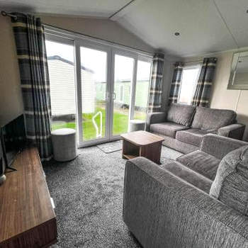 Lovely Caravan With Decking On California Cliffs Holiday Park Ref 50045c