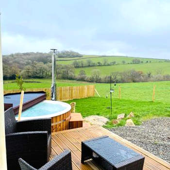 Private country caravan surrounded by fields